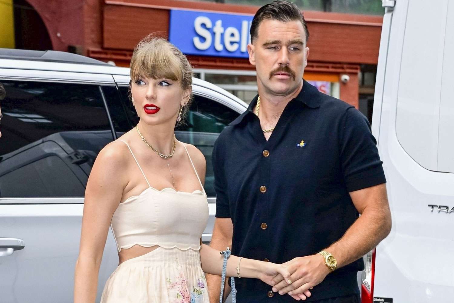 Taylor Swift and Travis Kelce Give Off “Grease ”Vibes in Dreamy Floral Dress and Slicked-Back Hair Look at N.Y.C. Wedding