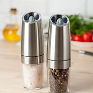 Battery-operated grinders that grind salt and pepper with the push of a button. Adjustable grinding mechanism for coarse or fine grind. Easy to use and refill. Available in various designs and colors.