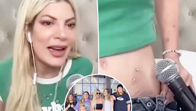 Tori Spelling debuts multiple stomach piercings in new Mother’s Day post