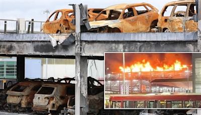 Burnt out motors still stranded at Luton airport car park months after huge fire