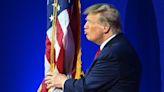 Trump kisses and hugs flag and does strange swaying to music ahead of CPAC speech