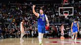 Doncic scores franchise-record 73 points, tied for 4th in NBA history, as Mavs edge Hawks 148-143