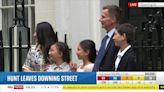 Moment Jeremy Hunt leaves Downing Street with his wife and children