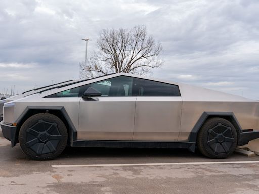 Camping in the Tesla Cybertruck sure seems overly complicated compared to a plain old rooftop tent on a Rivian R1T