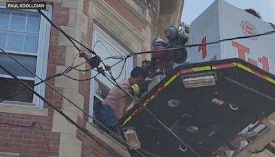 Video shows firefighters rescuing trapped residents from Massachusetts apartment fire