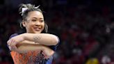 Suni Lee helped spark skyrocketing interest in college gymnastics, but says she won't 'let it get to my head'