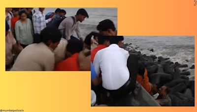 WATCH: Mumbai police constables at Marine Drive risk their lives to save elderly woman from drowning, video goes viral