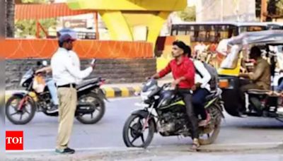 Beware bikers! Talking to pillion while riding now punishable in this state: Details - Times of India