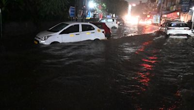 SUV spins out of control in Gurgaon's flooded waters after heavy rain, driver stuck inside. Video