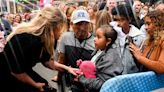 Kelly Clarkson comforts young fan with cancer on the TODAY plaza: 'You are not alone'