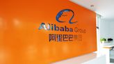 Alibaba slides after reporting plummet in profit