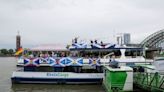 Scots lads head on party boat down Cologne's Rhine river with tiny baby on board