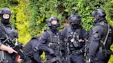 Armed police swarm park as Bushey murder search 'appears to narrow'