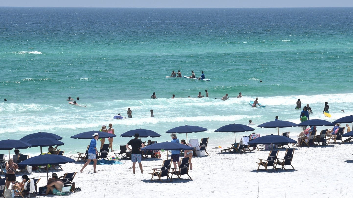 Back-to-back shark attacks injure 2 teens, adult near Florida beach; one victim loses arm