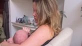 New mother Emily Atack shares sweet video doting on her baby