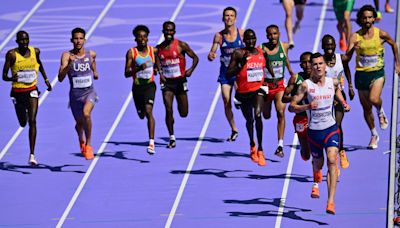 WATCH: Cameraman moseys onto Olympic track during men's 5000m race, nearly crashes into runners