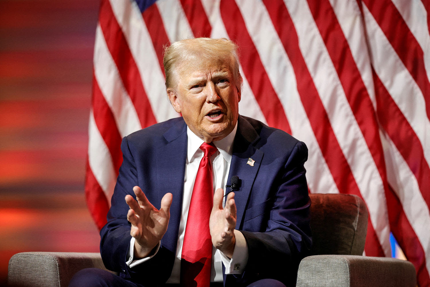 Trump falsely accuses Harris of deciding to 'turn Black' during a combative panel with Black journalists