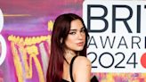 Dua Lipa Put a Twist on the Iconic 2000s “Pouf” Hairstyle — See Photos