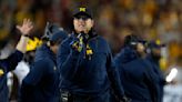 NCAA investigators interview Jim Harbaugh's staff about sign-stealing scheme, AP source says