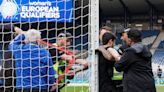 Protester chains himself to goalpost at behind-closed-doors match between Scotland and Israel