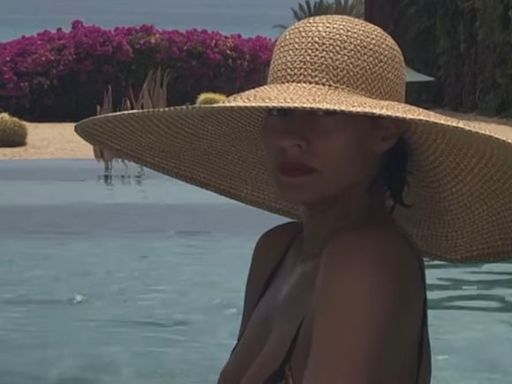 Tracee Ellis Ross Sunbathing in a Bikini and Massive Straw Hat Is the Best Thing You’ll See Today