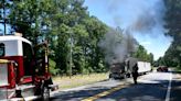 Truck pulling mobile home catches fire on Charleston Highway