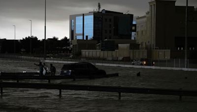 Storm dumps a year and a half’s worth of water on parts of UAE, flooding roads and Dubai’s airport