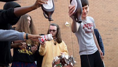 Monroe High School Principal Steve Pollzzie turned into a 'human sundae' – again