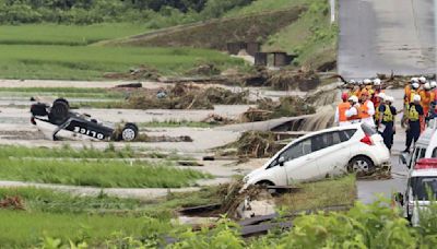 Heavy rain in northern Japan triggers floods and landslides, forcing hundreds to take shelter