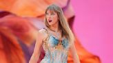 Fans go WILD after Taylor Swift brings boyfriend Travis Kelce on stage