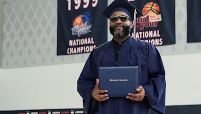 One of UConn’s first men’s basketball champs earns his degree