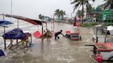 Cyclone floods coastal villages and cuts power in Bangladesh, where 800,000 had evacuated