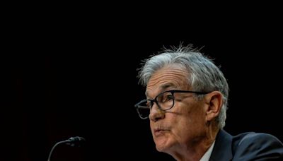 Powell says he will stay at Fed through end of term as chair