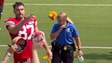 Travis Kelce Tosses Gloves To Taylor Swift Fan At Chiefs' Training Camp