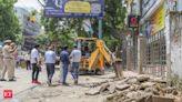 Bulldozer removes encroachments in Delhi's Rajinder Nagar after flooding tragedy at Rau's coaching centre - The Economic Times