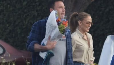 Putting rumours to rest? Ben Affleck and Jennifer Lopez seen publicly with wedding rings on after split speculation