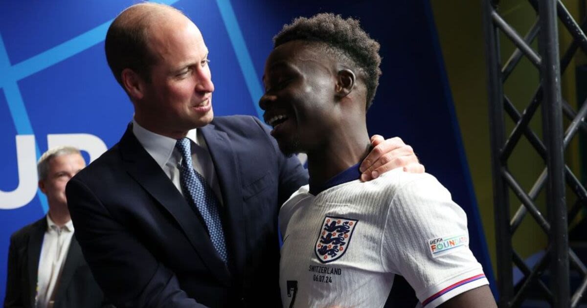 Jubilant Prince William hugs goal hero Bukayo Saka as England make semi-finals