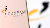 Catering firm Compass lifts profit forecast after strong first half