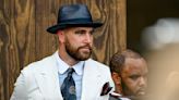 Travis Kelce looks dapper at the Kentucky Derby in pinstripe suit and fedora