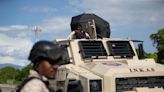 Haitian police briefly lose control of armored car