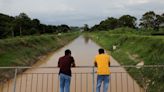 In Malaysia, migrants say they are in limbo after promised jobs fall through