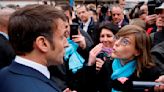 France's Macron heckled by crowd angry over pensions