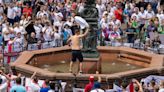 Moment England fan belly flops into fountain in his pants ahead of Euros clash