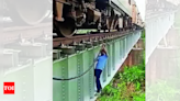 As train comes to halt, loco pilots risk their lives to crawl along bridge’s edge & fix fault | India News - Times of India