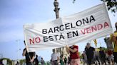 Protesters spray water guns at tourists in Barcelona as thousands rally against overtourism