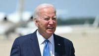 US President Joe Biden speaks to the press as he arrives at Joint Base Andrews in Maryland on July 23, 2024. Biden is returning to the White House after spending nearly a week at his personal residence recovering from...