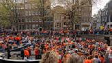 Orange crush: Boats packed with revelers tour Amsterdam canals to celebrate the king’s birthday - The Boston Globe