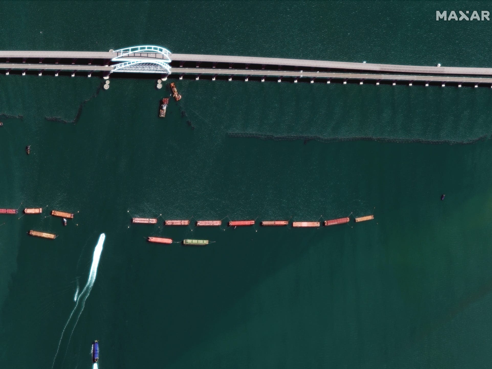 Satellite images show Russia is putting ships in the path of Ukraine's naval drones to protect Putin's prize, but it's likely not enough