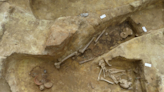 50 ancient graves discovered below bustling train station in Paris, officials say