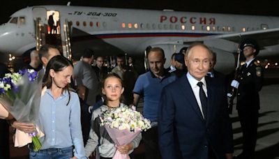 Children of freed sleeper agents learned they were Russians on the flight, Kremlin says